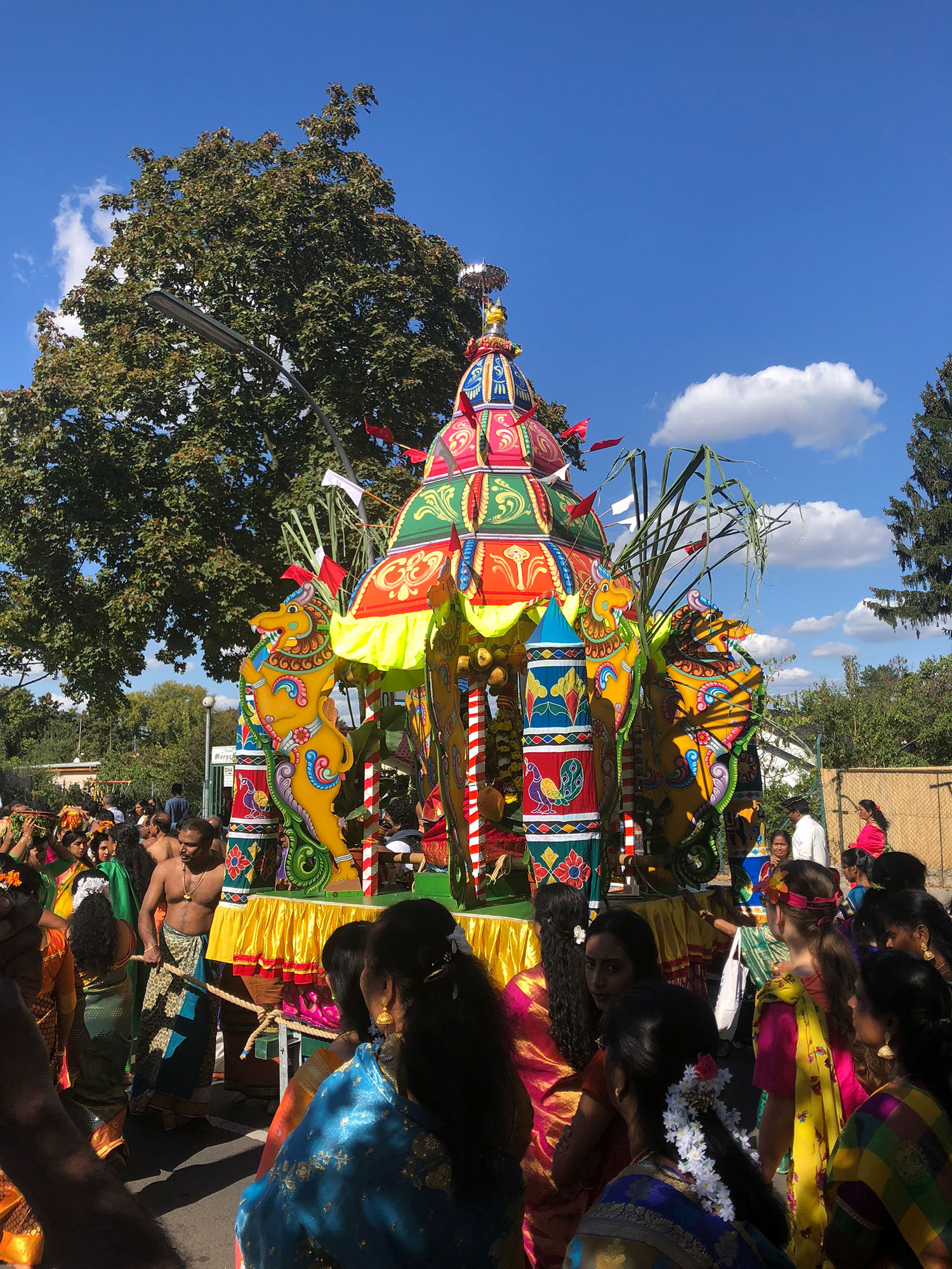 A four-wheeled vehicle called chariot used for processions of images of God. Decorated with flowers and garlands.